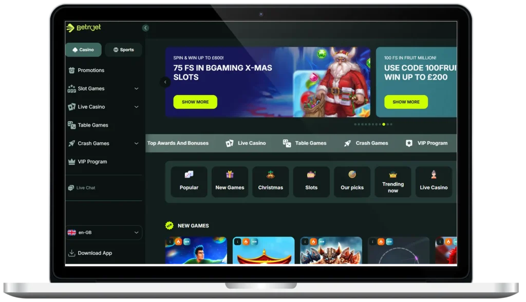 BetNjet casino interface on a laptop, showing its design and game sections for a platform overview.